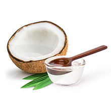 Das Bild zeigt auf weißem Hintergrund: Kokosöl